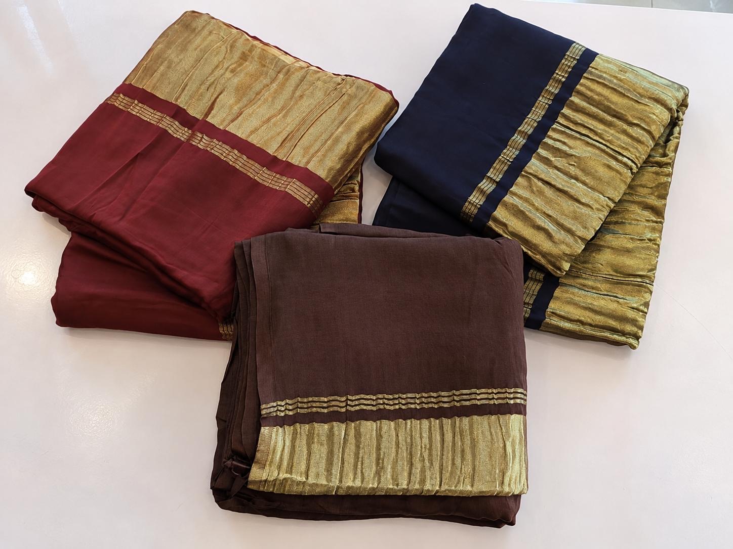 Traditional saree with gold and maroon borders