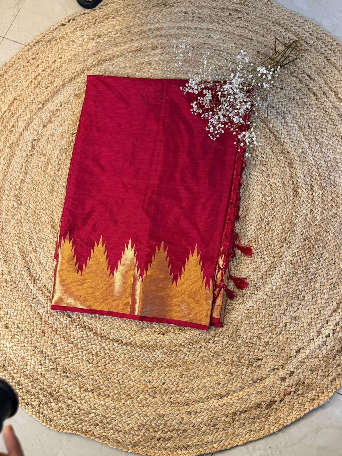 Elegant red textile with gold detailing
